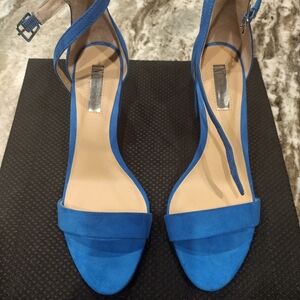 Women blue heels. Size 9 1/2. Made by INC